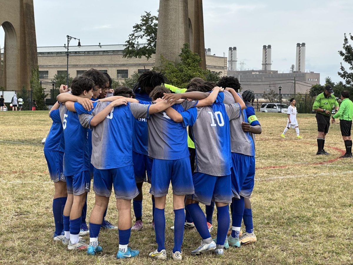 Baruch Boys post game huddle.