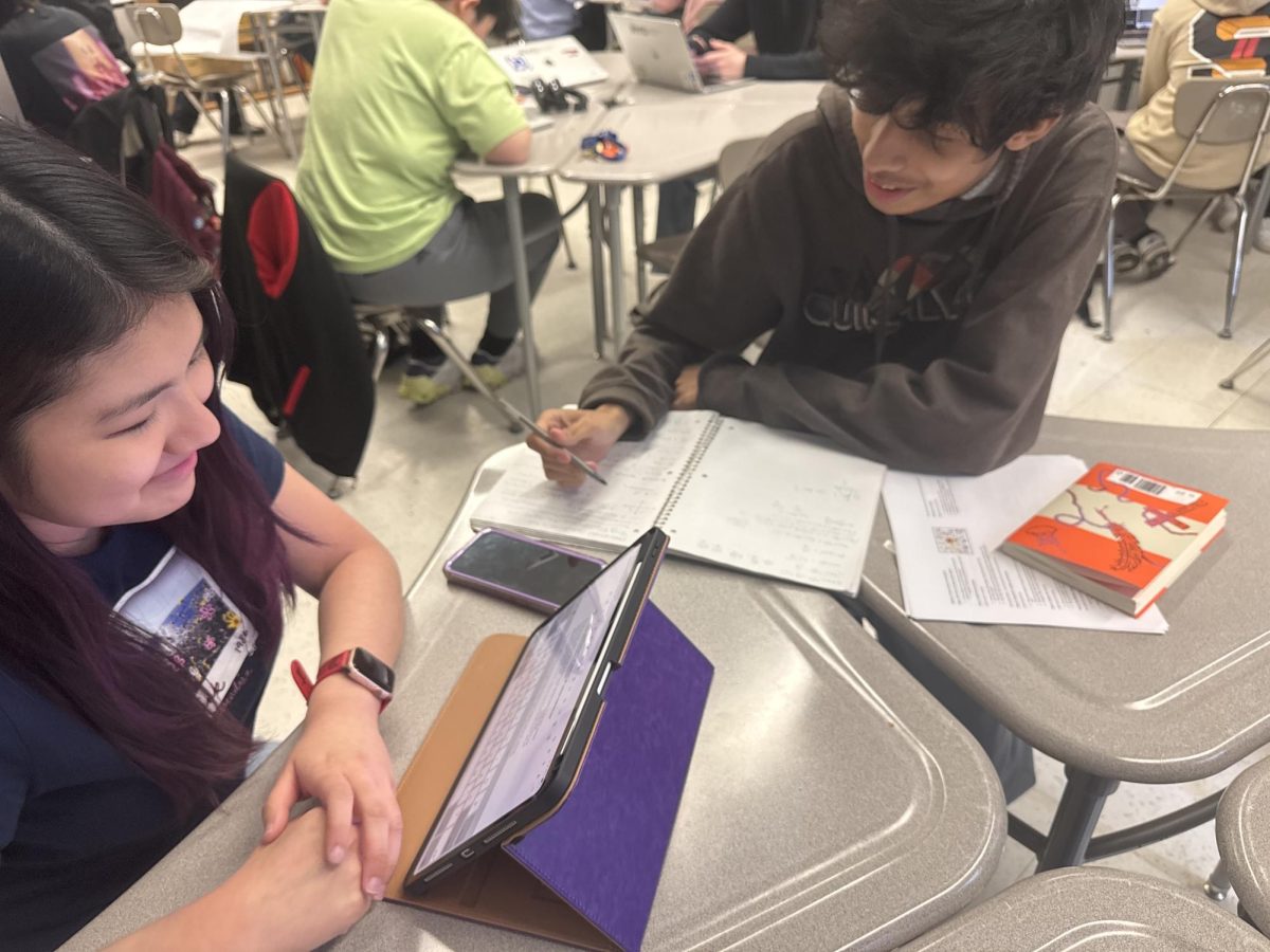 Photograph of students studying.