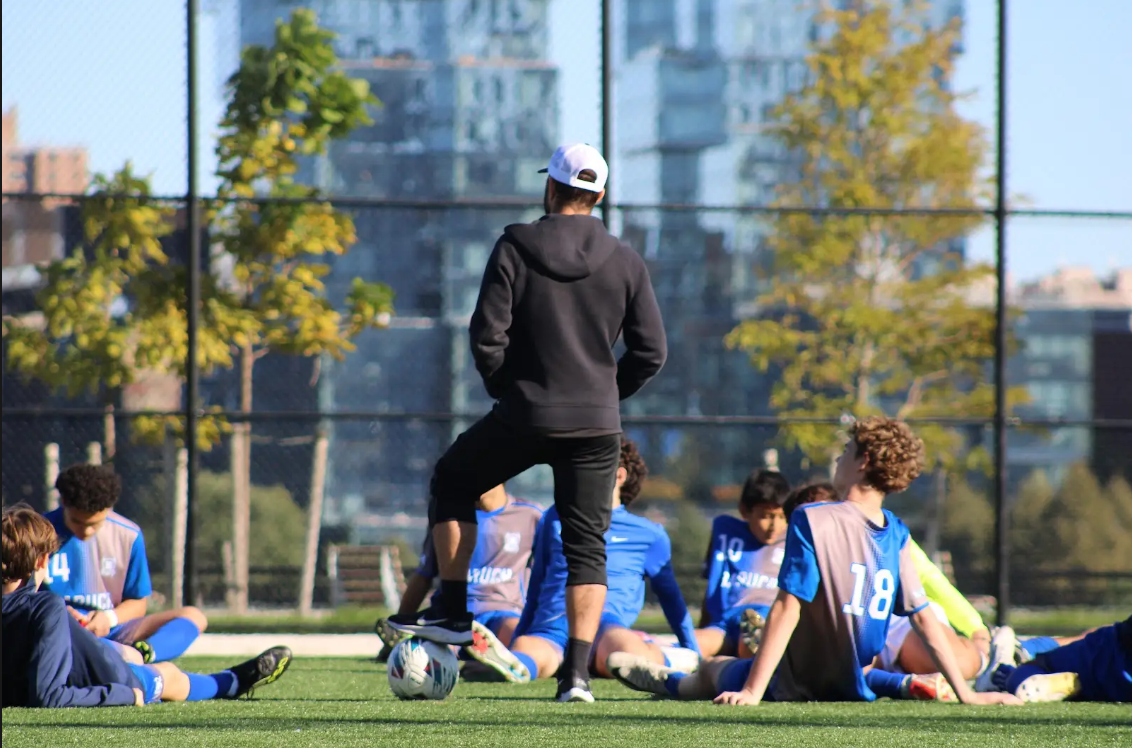 Coach Breman at a boys soccer game.