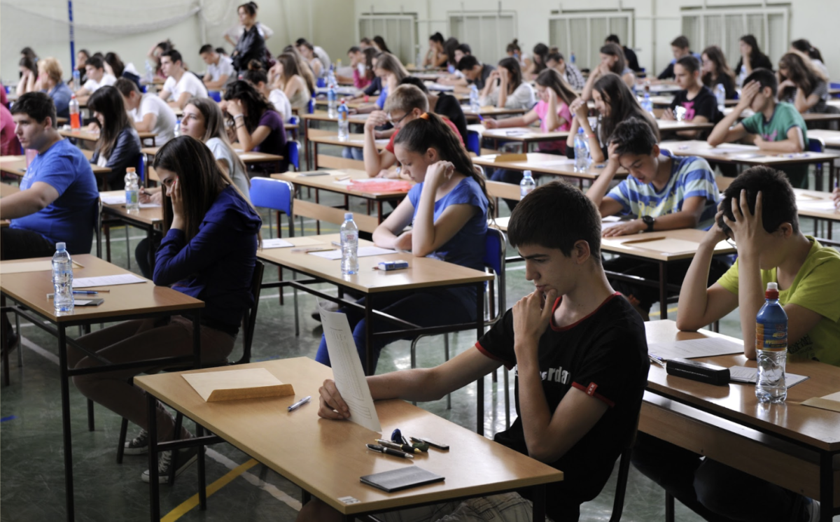 Students looking really depressed because they're taking a Regents exam.